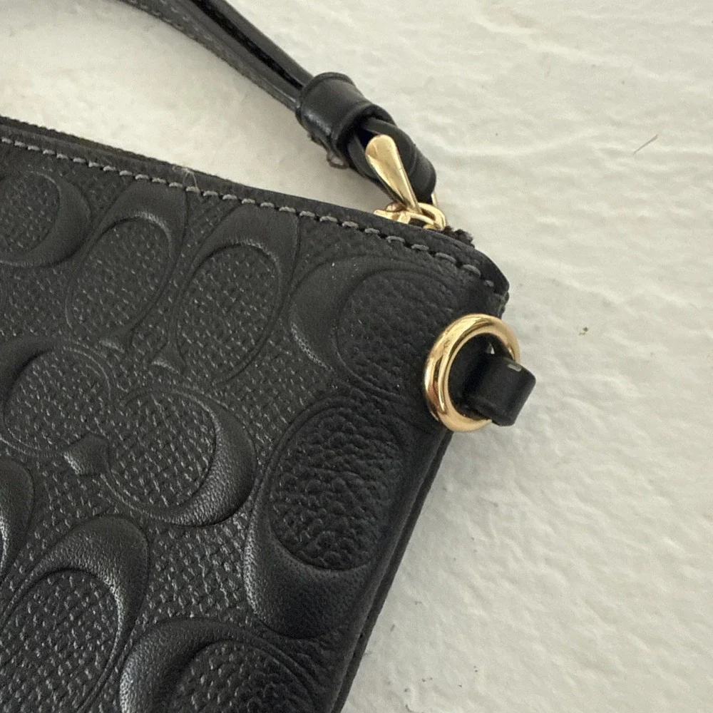 Coach Corner Zip Wristlet in Signature Leather (model F67555)
